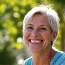 Maria G. looking vibrant and healthy, representing holistic wellness improvements